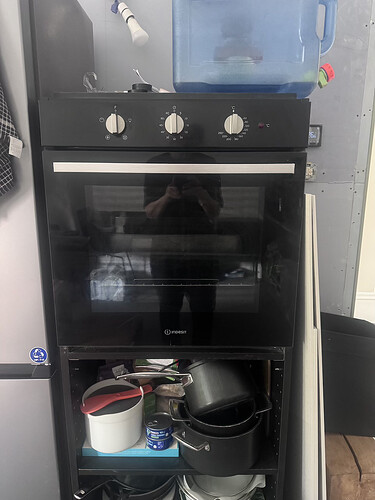 Washing machine and oven in housing for sale